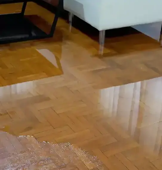 Water-damaged hardwood floor — wood floor water damage in Santa Clarita, CA by Bailey Water Damage Restoration